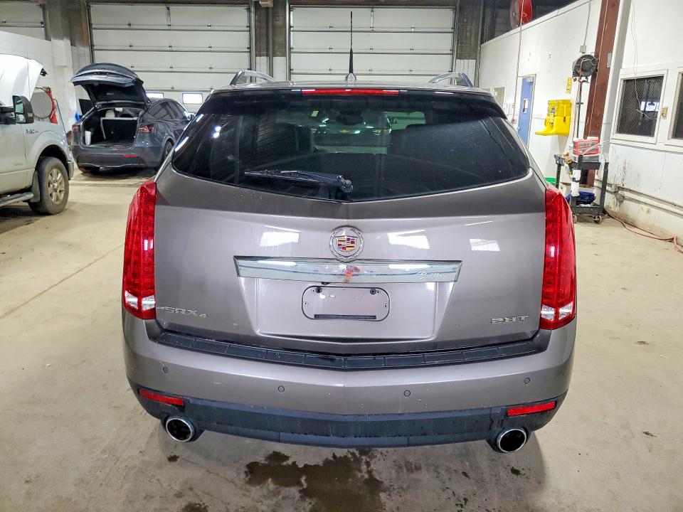 54166626 :رقم المزاد ، 3GYFNKE66BS598119 vin ، 2011 Cadillac Srx مزاد بيع