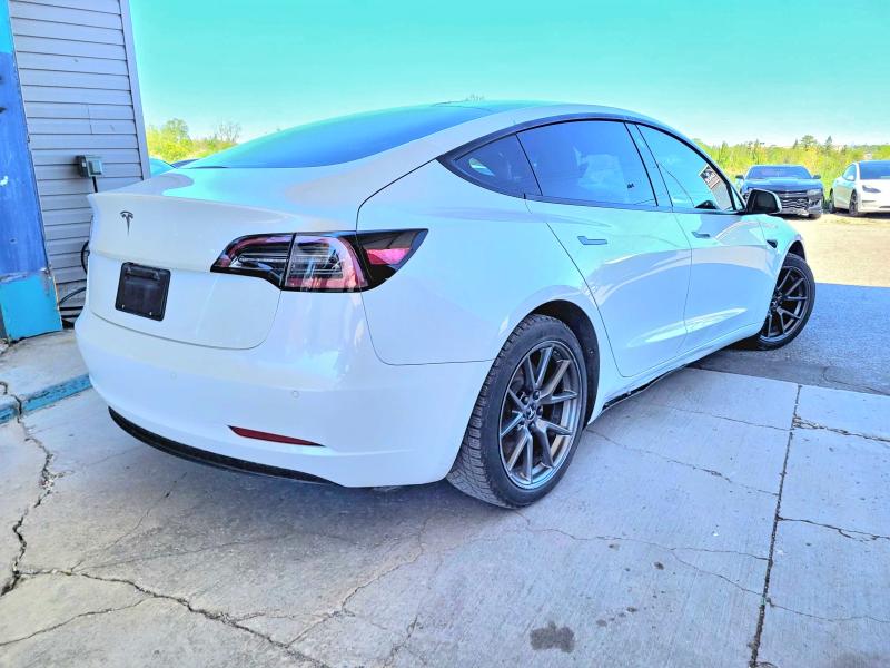 54809106 :رقم المزاد ، 5YJ3E1EA3MF031983 vin ، 2021 Tesla Model 3 مزاد بيع