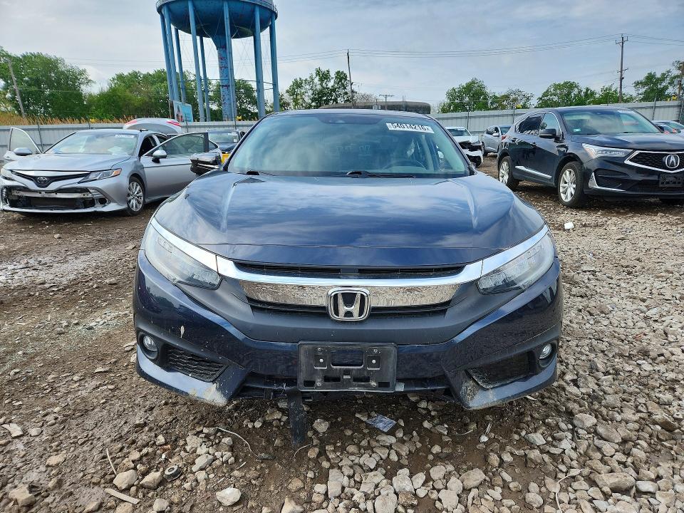 Auction sale of the 2018 Honda Civic, vin: JHMFC1F99JX011972, lot number: 54014216