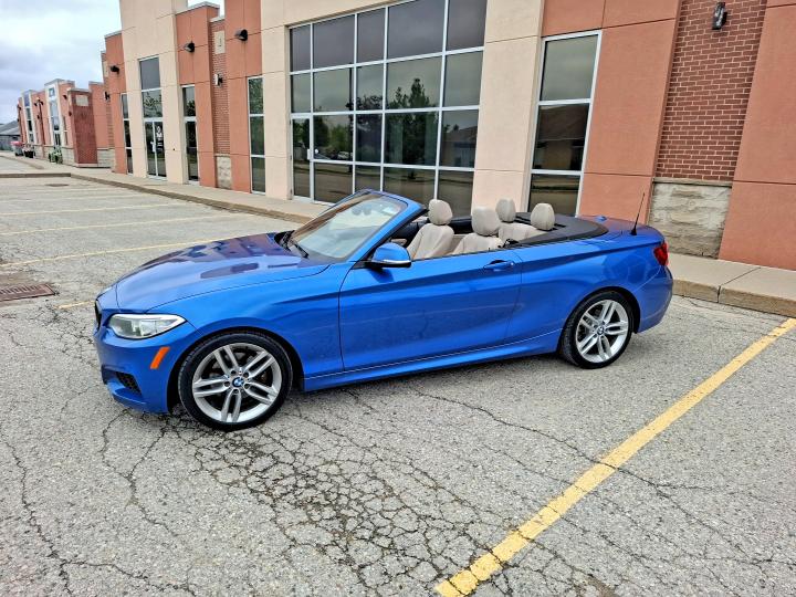 55233256 :رقم المزاد ، WBA1K7C50FV235358 vin ، 2015 Bmw 228 مزاد بيع