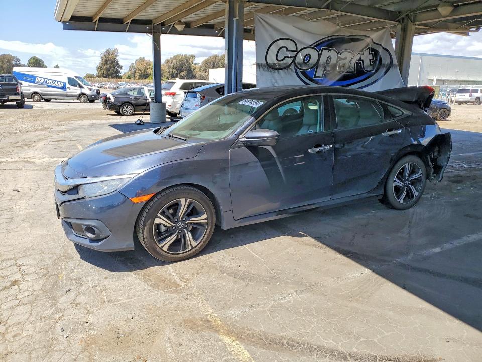 Auction sale of the 2016 Honda Civic, vin: 19XFC1F96GE215882, lot number: 54894256