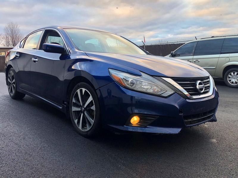 Auction sale of the 2018 Nissan Altima, vin: 1N4AL3AP1JC123580, lot number: 52285966