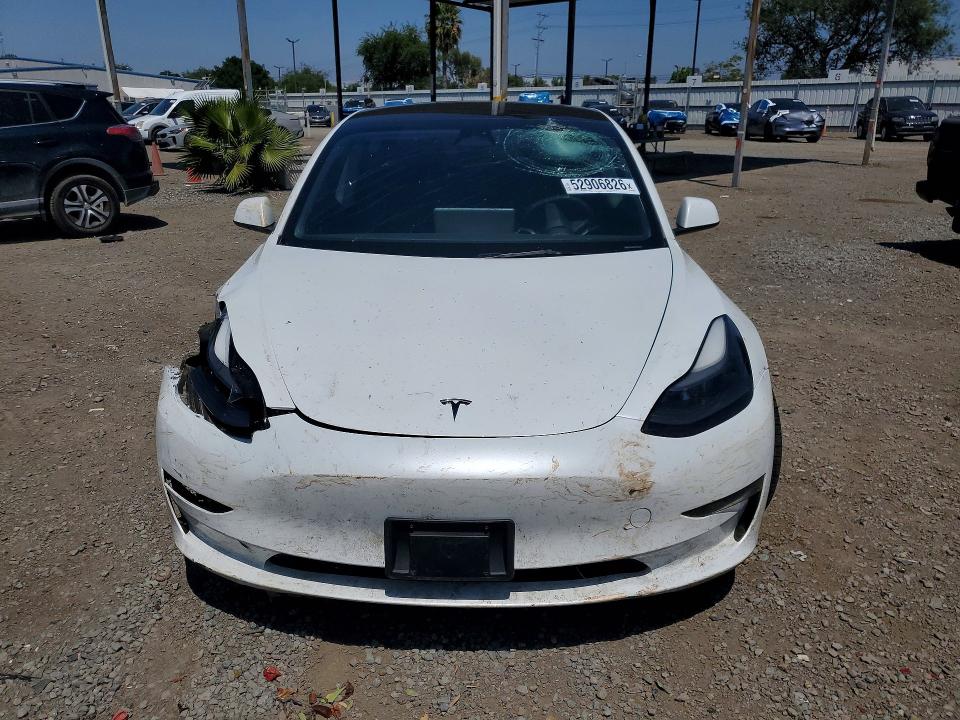 Продажа на аукционе авто 2023 Tesla Model 3, vin: 5YJ3E1EC7PF503494, номер лота: 52906826
