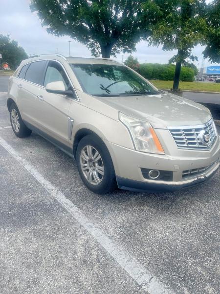 2015 Cadillac Srx მანქანა იყიდება აუქციონზე, vin: 3GYFNBE33FS623988, აუქციონის ნომერი: 55236566
