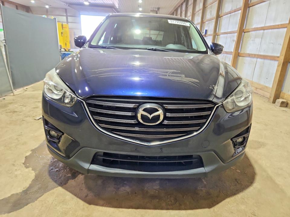 51795996 :رقم المزاد ، JM3KE4CY9G0676385 vin ، 2016 Mazda Cx-5 مزاد بيع