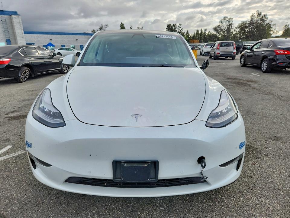 54712556 :رقم المزاد ، 5YJYGAEE7MF138473 vin ، 2021 Tesla Model Y مزاد بيع
