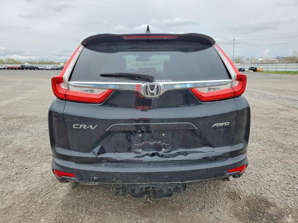 Auction sale of the 2018 Honda Cr-v, vin: 2HKRW2H8XJH140797, lot number: 52575626