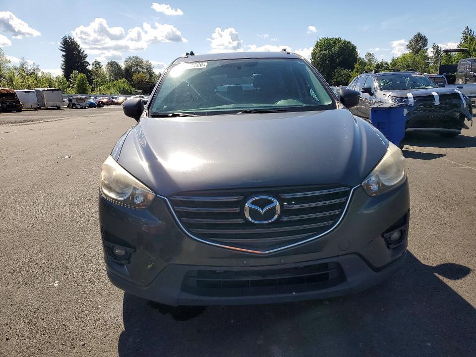 2016 Mazda Cx-5 Touring მანქანა იყიდება აუქციონზე, vin: JM3KE2CYXG0801124, აუქციონის ნომერი: 53112726
