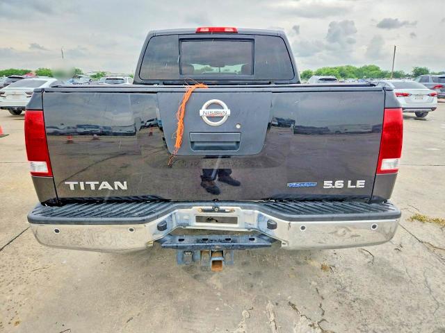 54477476 :رقم المزاد ، 1N6BA0ED3AN306659 vin ، 2010 Nissan Titan مزاد بيع