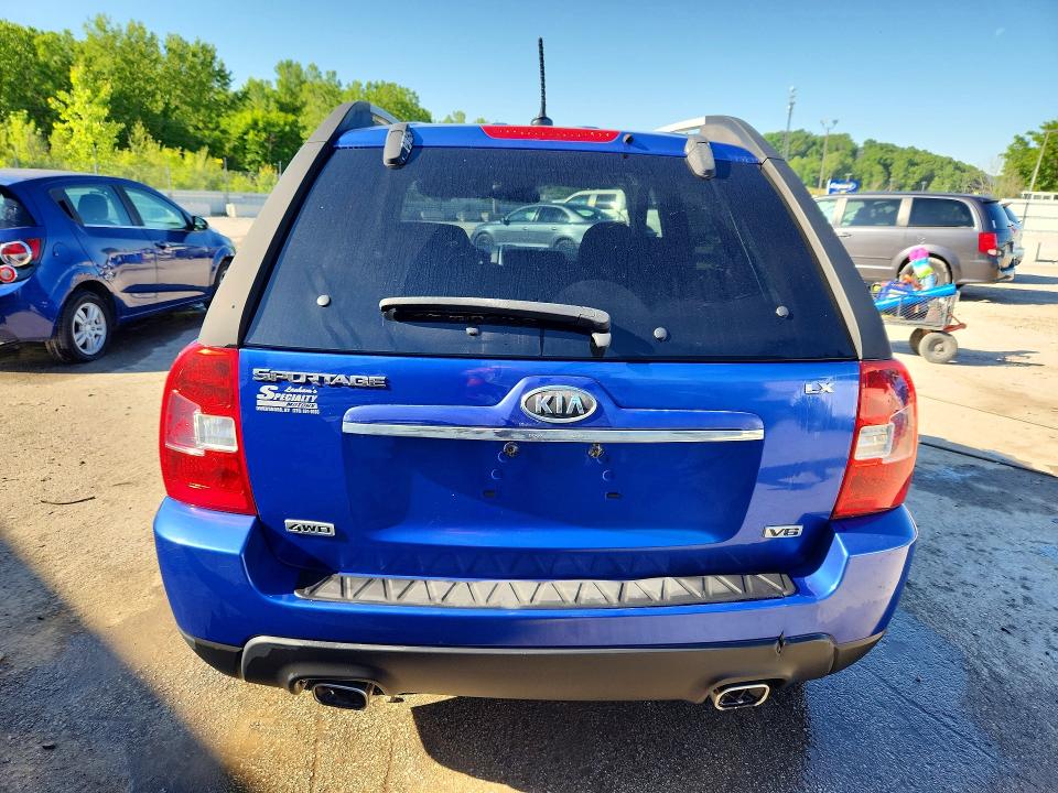52679666 :رقم المزاد ، KNDJE723097590727 vin ، 2009 Kia Sportage مزاد بيع