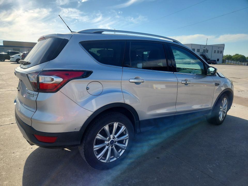 Продажа на аукционе авто 2017 Ford Escape, vin: 1FMCU0J98HUA65032, номер лота: 53692486