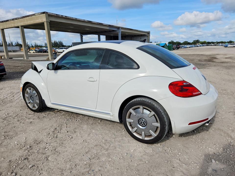 52570386 :رقم المزاد ، 3VWJP7AT1DM666432 vin ، 2013 Volkswagen Beetle مزاد بيع