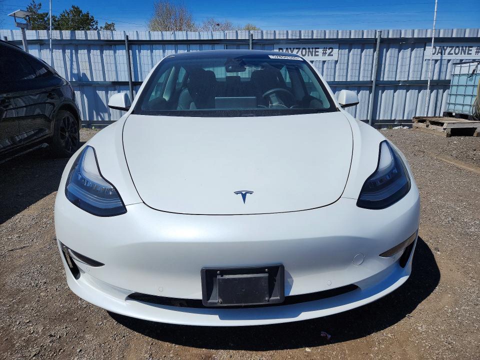 Продажа на аукционе авто 2021 Tesla Model 3, vin: 5YJ3E1EB2MF855191, номер лота: 52890346