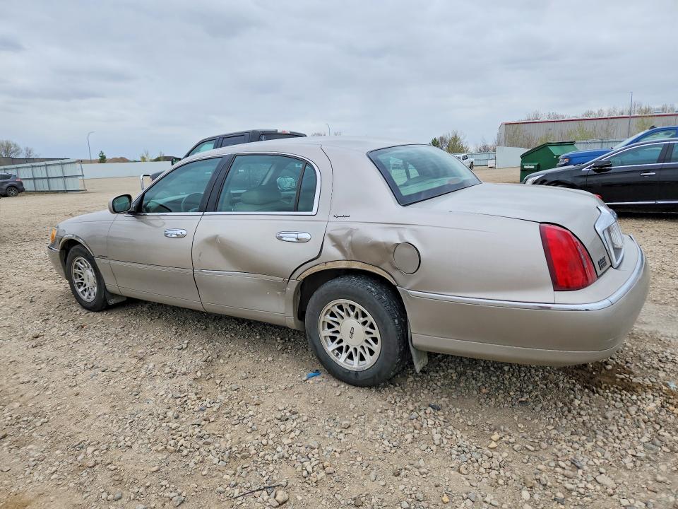 52152086 :رقم المزاد ، 1LNHM82WXXY617095 vin ، 1999 Lincoln Town Car مزاد بيع
