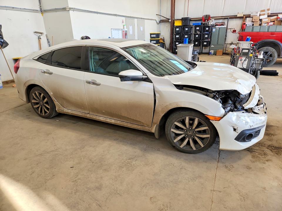 2017 Honda Civic Touring 4dr მანქანა იყიდება აუქციონზე, vin: 2HGFC1F98HH102202, აუქციონის ნომერი: 52313876