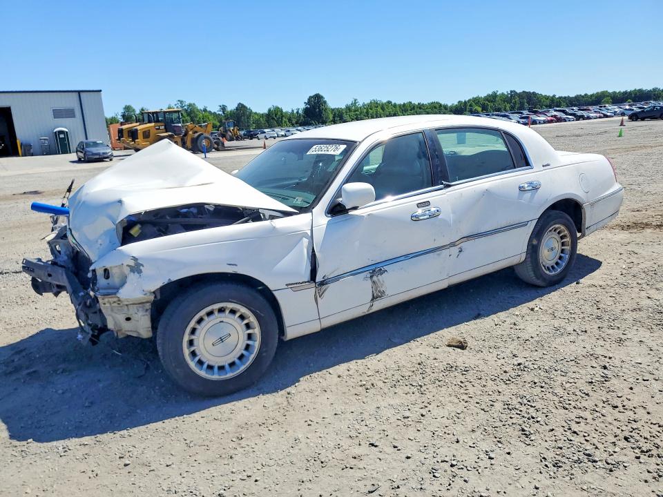 1999 Lincoln Town Car მანქანა იყიდება აუქციონზე, vin: 1LNHM81W4XY689265, აუქციონის ნომერი: 53625276