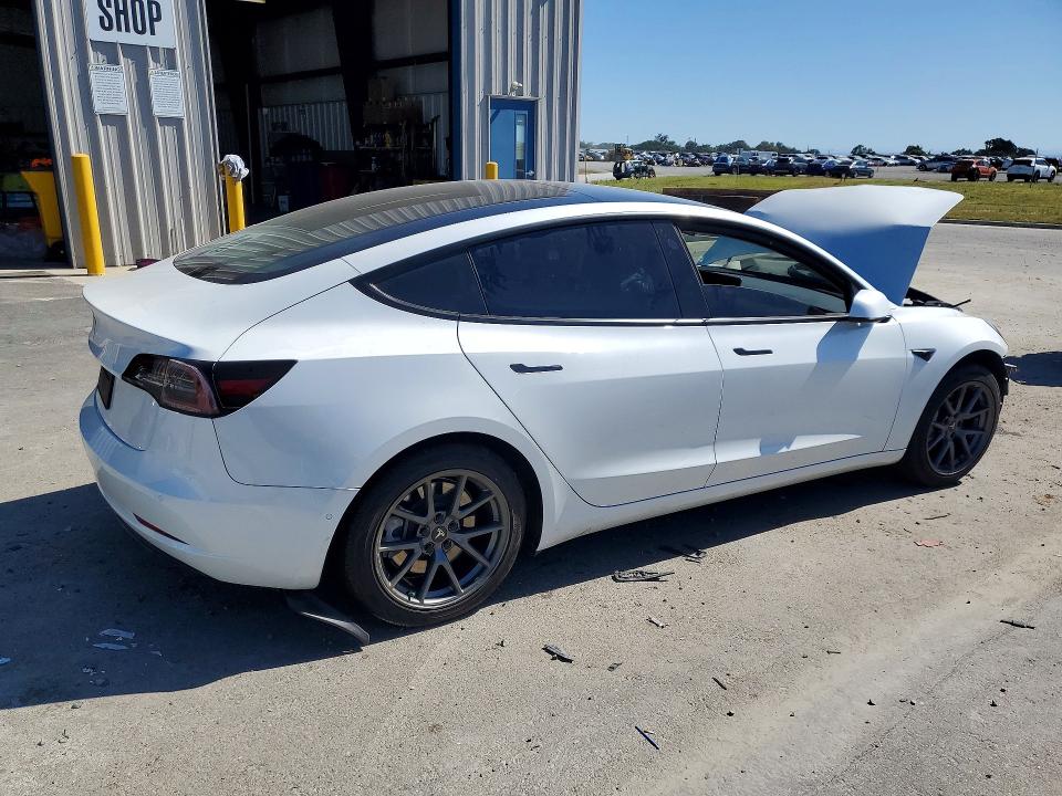 Продажа на аукционе авто 2021 Tesla Model 3, vin: 5YJ3E1EAXMF874482, номер лота: 52966746