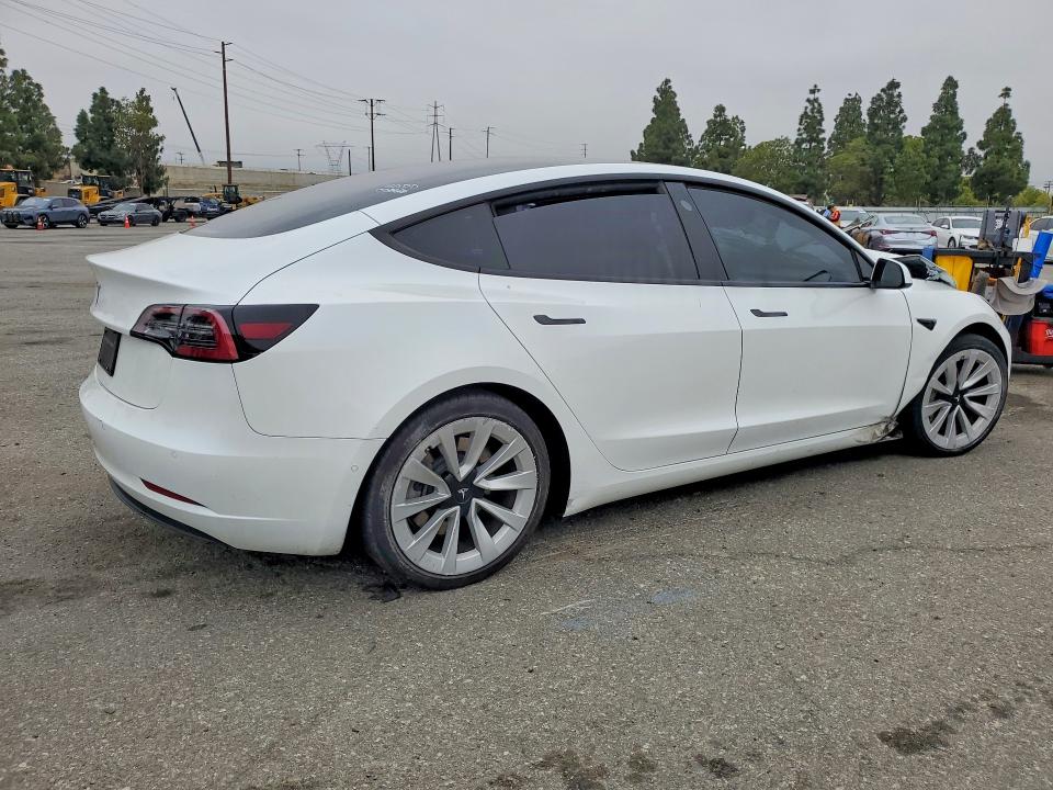 Продажа на аукционе авто 2022 Tesla Model 3, vin: 5YJ3E1EAXNF302703, номер лота: 53306046