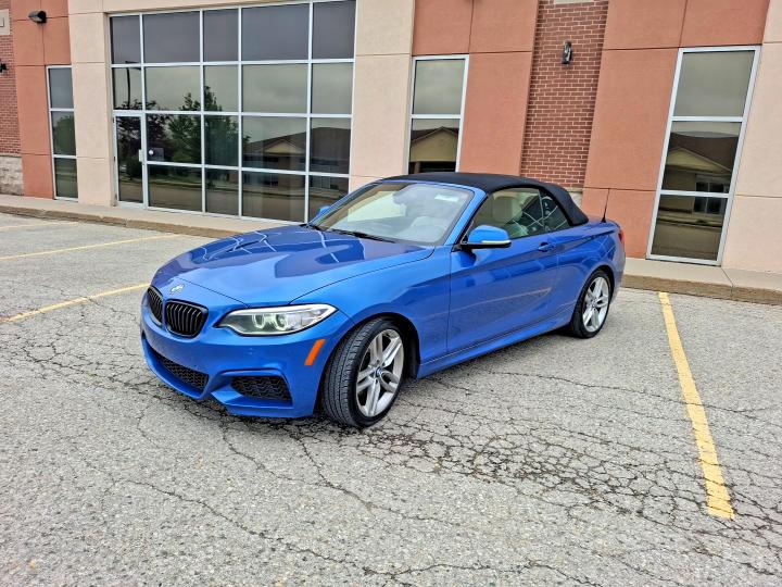 55233256 :رقم المزاد ، WBA1K7C50FV235358 vin ، 2015 Bmw 228 مزاد بيع