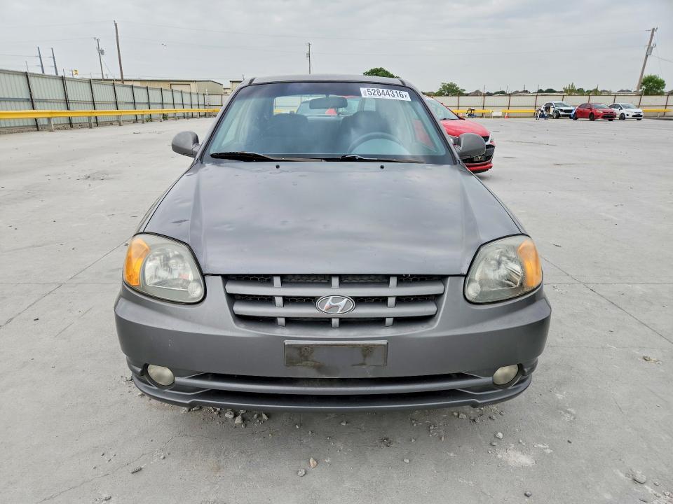 52844316 :رقم المزاد ، KMHCG35C75U322188 vin ، 2005 Hyundai Accent مزاد بيع