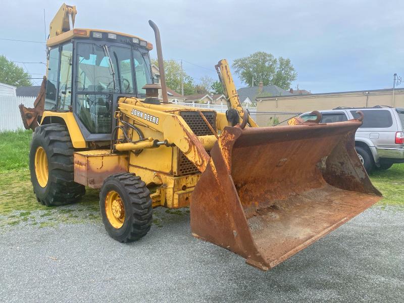 53790926 :رقم المزاد ، T0410DG794661 vin ، 1993 John Deere 410 مزاد بيع