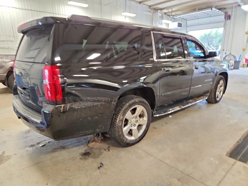 Продажа на аукционе авто 2015 Chevrolet Suburban, vin: 1GNSKKKC3FR738697, номер лота: 55096256