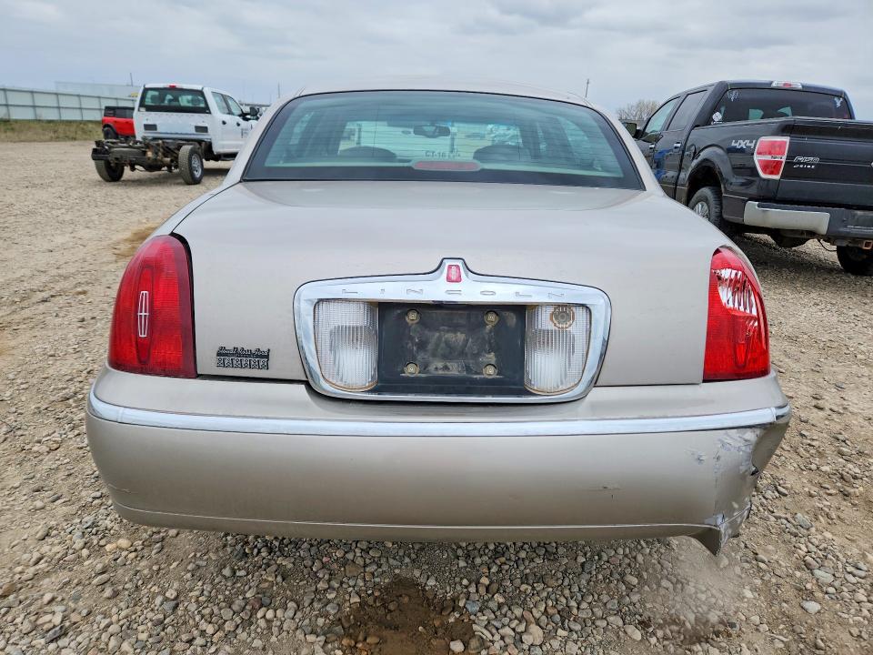 52152086 :رقم المزاد ، 1LNHM82WXXY617095 vin ، 1999 Lincoln Town Car مزاد بيع