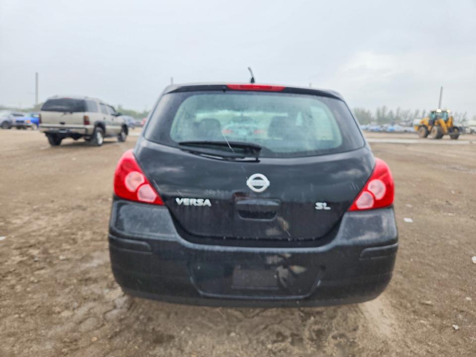 53223806 :رقم المزاد ، 3N1BC13EX9L353362 vin ، 2009 Nissan Versa مزاد بيع