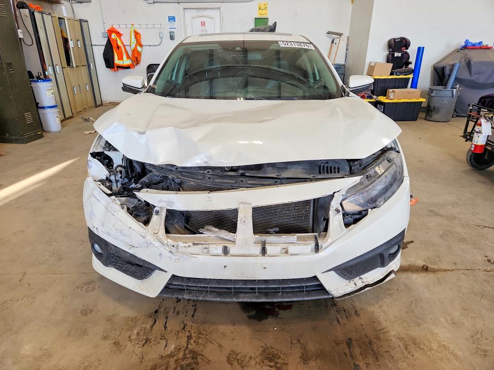 2017 Honda Civic Touring 4dr მანქანა იყიდება აუქციონზე, vin: 2HGFC1F98HH102202, აუქციონის ნომერი: 52313876