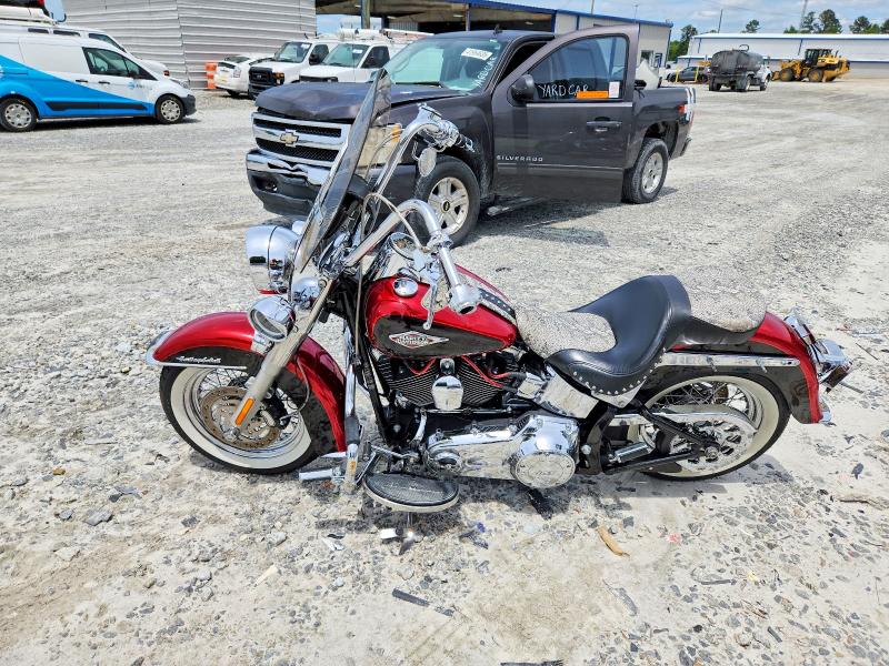 53003656 :رقم المزاد ، 1HD1BWV13CB044567 vin ، 2012 Harley-davidson Flstc مزاد بيع