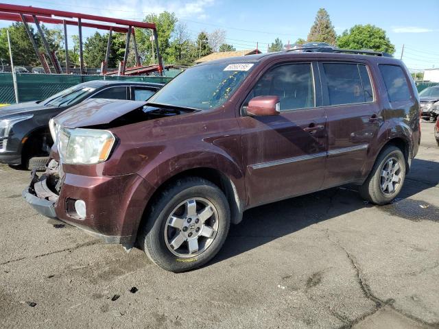 60565195 :رقم المزاد ، 5FNYF4H90BB039560 vin ، 2011 Honda Pilot Touring مزاد بيع