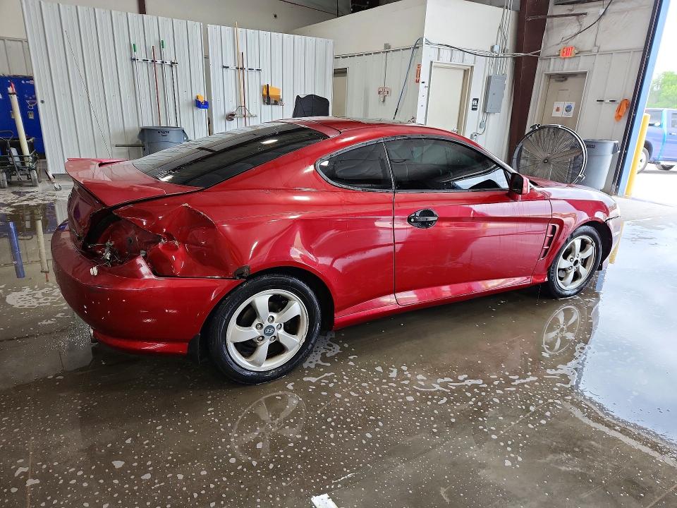 57429196 :رقم المزاد ، KMHHM65D26U211087 vin ، 2006 Hyundai Tiburon مزاد بيع