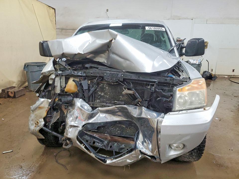56186866 :رقم المزاد ، 1N6AA0EC4AN307676 vin ، 2010 Nissan Titan مزاد بيع