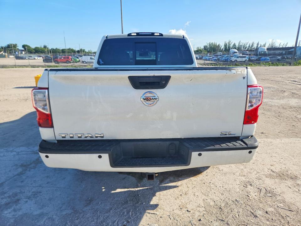56511606 :رقم المزاد ، 1N6AA1E69HN571874 vin ، 2017 Nissan Titan مزاد بيع