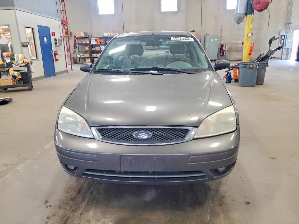 56029966 :رقم المزاد ، 1FAFP34N15W167054 vin ، 2005 Ford Focus مزاد بيع