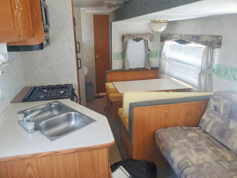 56609616 :رقم المزاد ، 4X4TWDE244Y232972 vin ، 2004 Forest River Wildwood Towables مزاد بيع