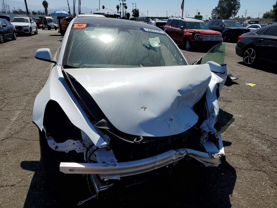 Продажа на аукционе авто 2021 Tesla Model 3, vin: 5YJ3E1EC0MF064182, номер лота: 56852706