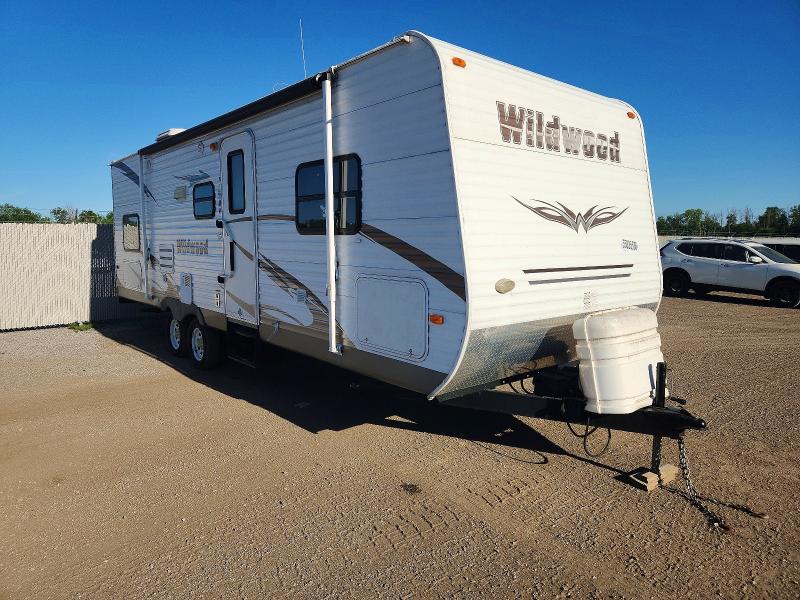 Auction sale of the 2012 Wildwood By Forest River Recreational Vehicle (rv), vin: 4X4TWDD28CA247368, lot number: 55835636