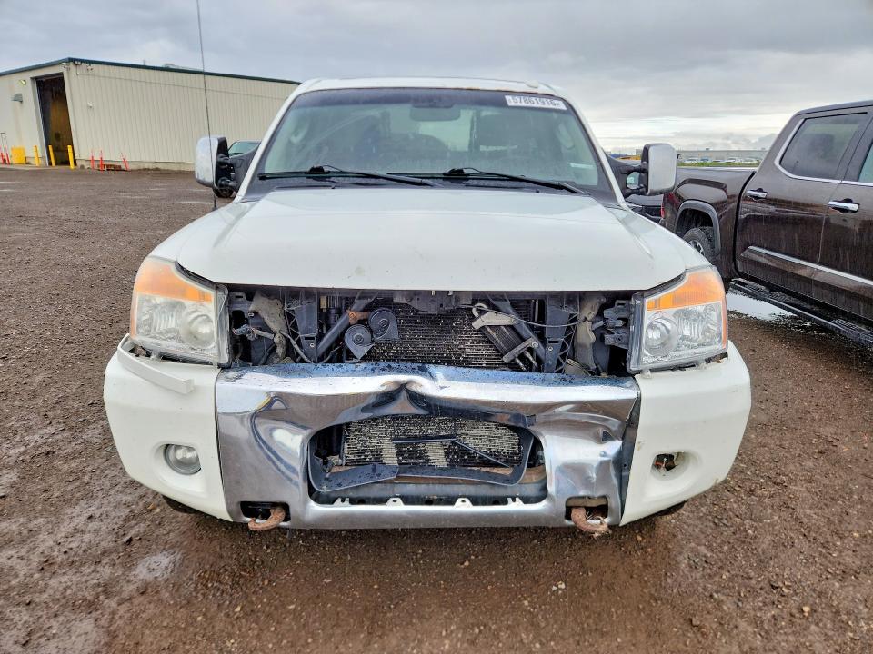 57861916 :رقم المزاد ، 1N6AA0EC2BN307158 vin ، 2011 Nissan Titan مزاد بيع