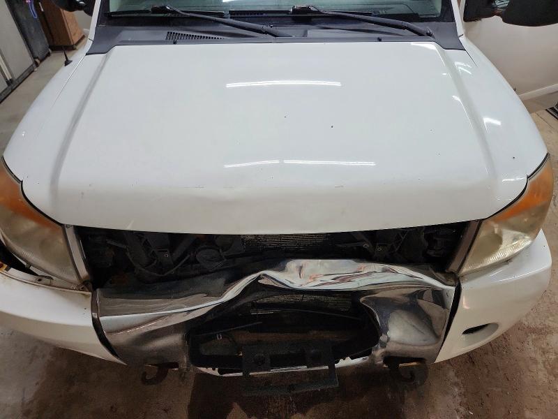 57263776 :رقم المزاد ، 1N6AA0EC2AN304324 vin ، 2010 Nissan Titan مزاد بيع
