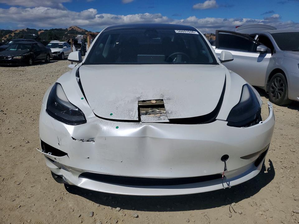 Продажа на аукционе авто 2021 Tesla Model 3, vin: 5YJ3E1EA7MF077574, номер лота: 56697636
