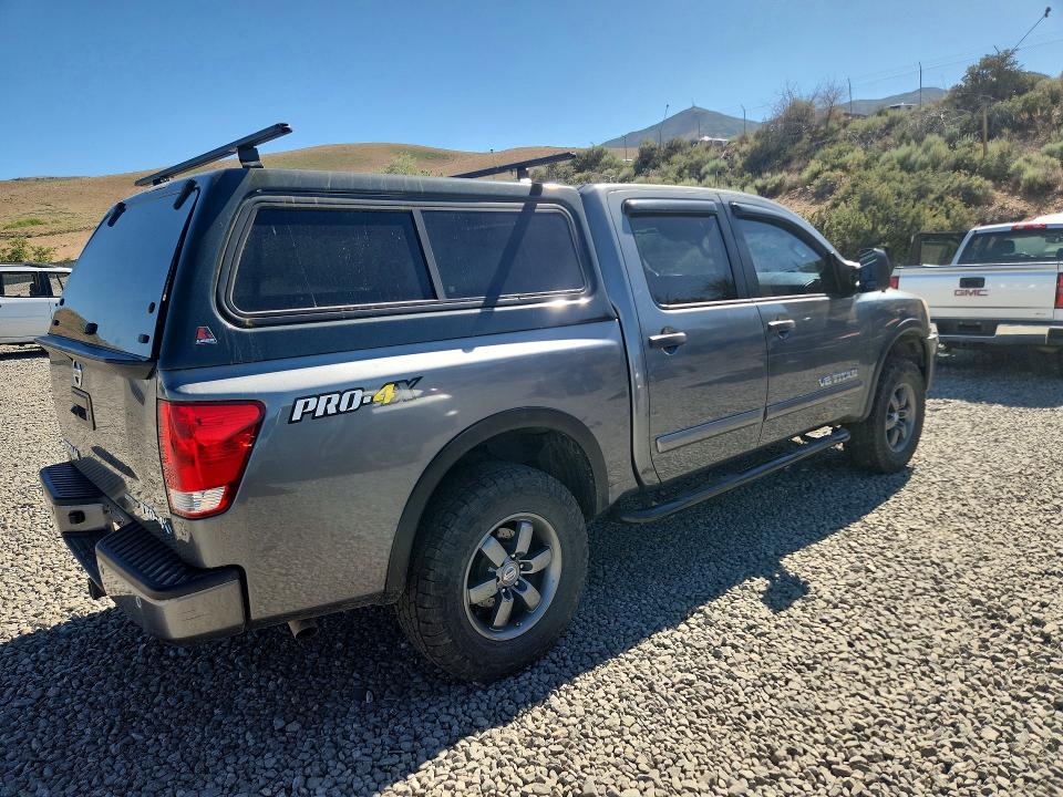 55170166 :رقم المزاد ، 1N6BA0EC9FN510090 vin ، 2015 Nissan Titan مزاد بيع