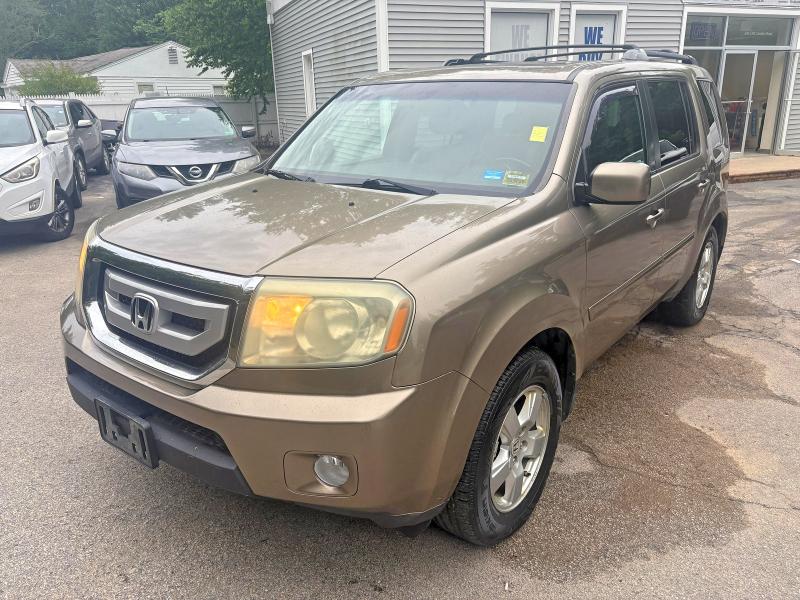 58615986 :رقم المزاد ، 5FNYF4H57BB010649 vin ، 2011 Honda Pilot مزاد بيع