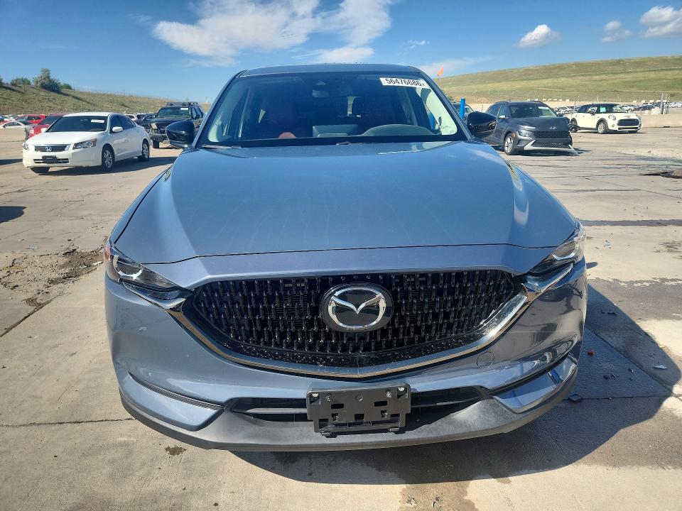 56476686 :رقم المزاد ، JM3KFBCY3M0454342 vin ، 2021 Mazda Cx-5 مزاد بيع