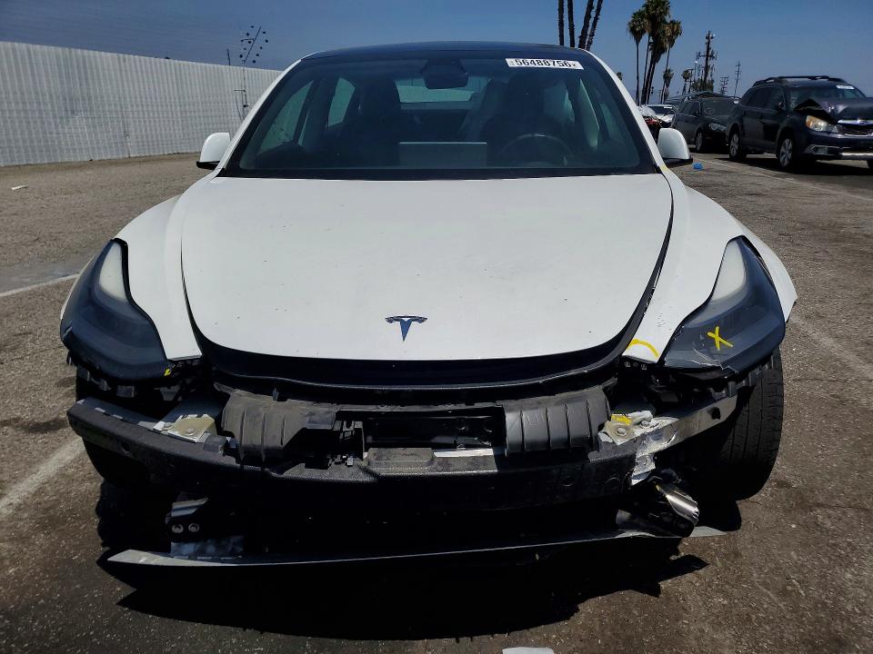 56488756 :رقم المزاد ، 5YJ3E1EA2MF068975 vin ، 2021 Tesla Model 3 مزاد بيع