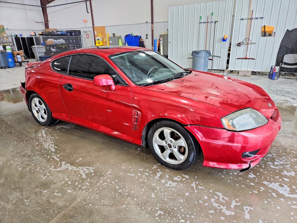 57429196 :رقم المزاد ، KMHHM65D26U211087 vin ، 2006 Hyundai Tiburon مزاد بيع
