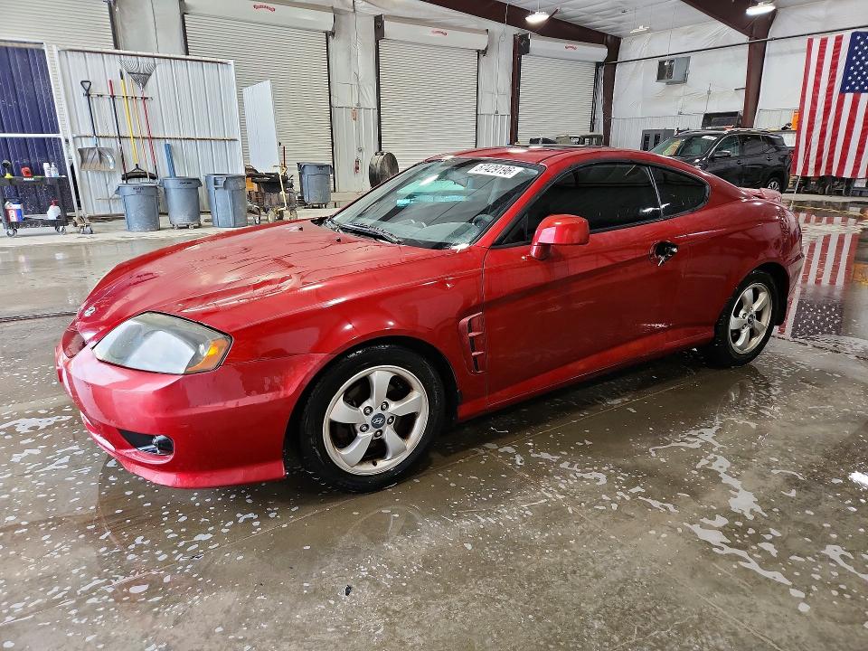 57429196 :رقم المزاد ، KMHHM65D26U211087 vin ، 2006 Hyundai Tiburon مزاد بيع