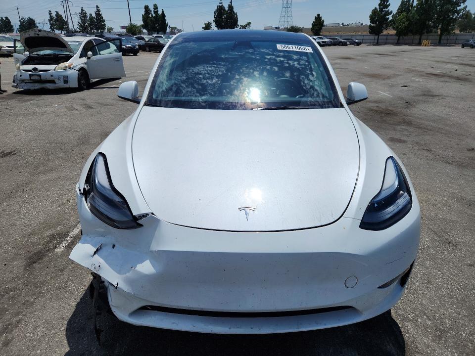 Продаж на аукціоні авто 2025 Tesla Model Y, vin: 7SAYGDED6SF272660, номер лоту: 58611066