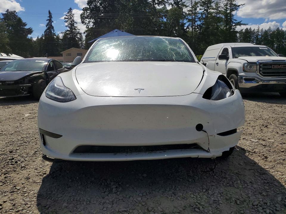 56094606 :رقم المزاد ، 7SAYGAEE7SF302773 vin ، 2025 Tesla Model Y مزاد بيع