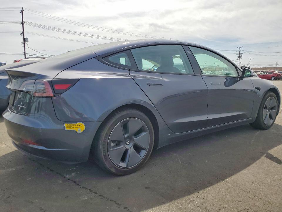 56892266 :رقم المزاد ، 5YJ3E1EBXNF323012 vin ، 2022 Tesla Model 3 مزاد بيع
